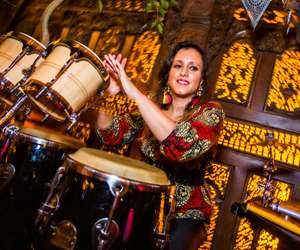 Percussionist in front of the Bali wall